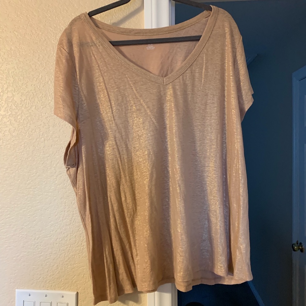 Gold metallic T-shirt.